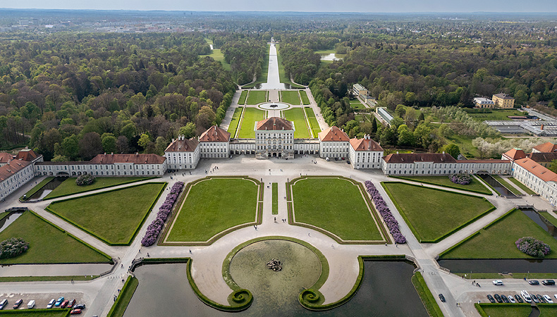 Nymphenburg Palace from the air, its wings spread along the canal and gardens.