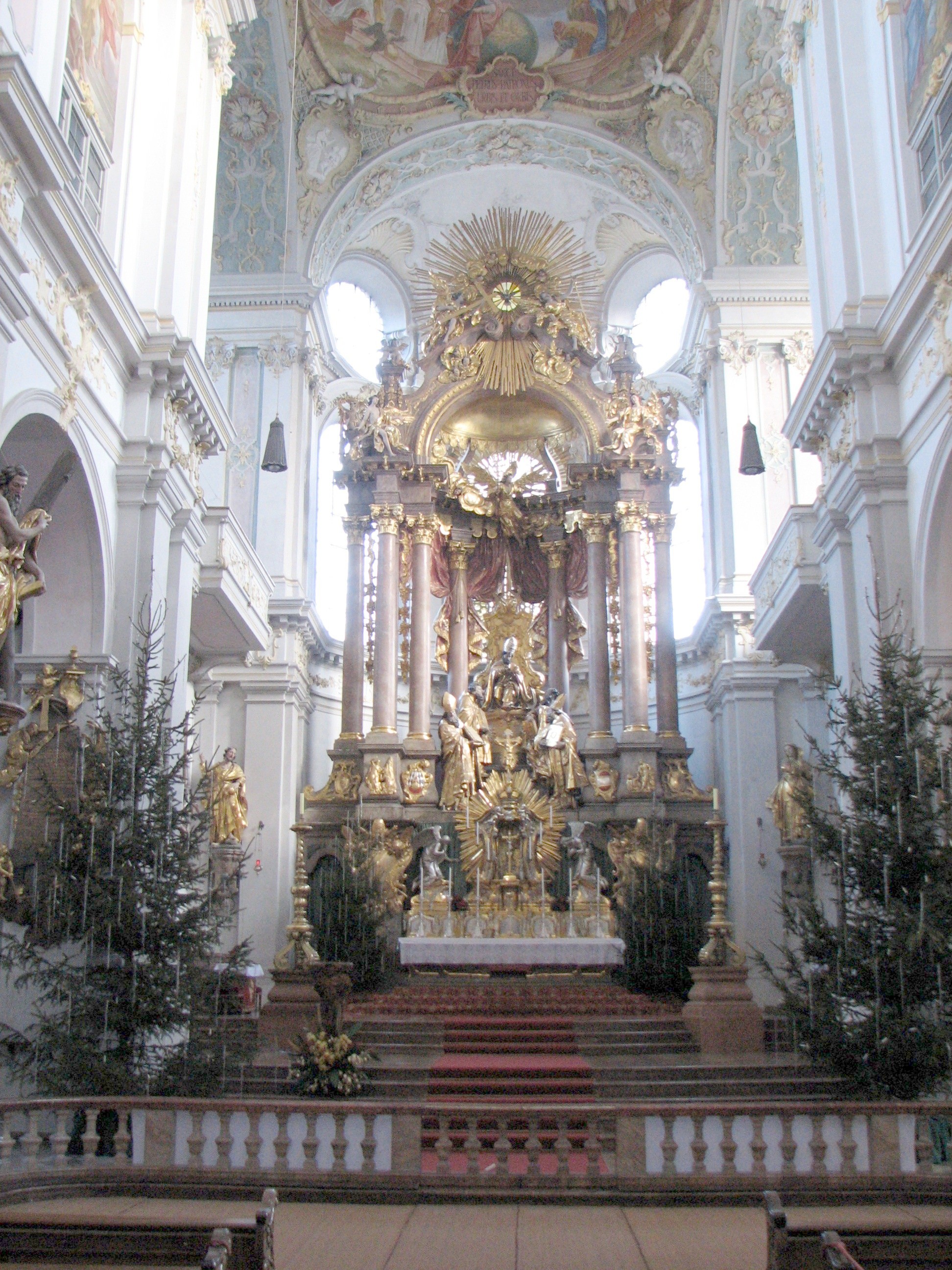 The interior of St Peter's church in Munich, looking towards the high altar.